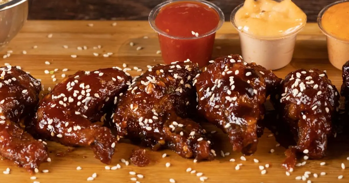 Wings and dips on a party platter - Wingstop game day order: how to feed a crowd