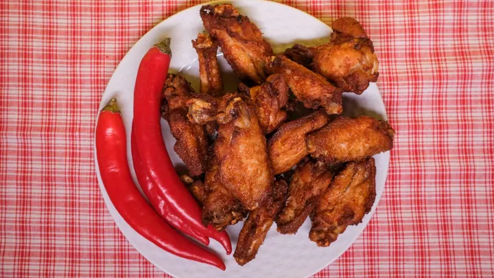 Wings By the Piece - Wingstop menu section photo